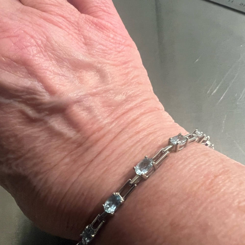Sterling Silver & Light Blue Topaz Tennis Bracelet - Picture 4 of 5